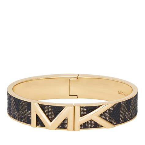 michael kors extra wide gold tone cuff bracelet|Michael Kors charm bracelet.